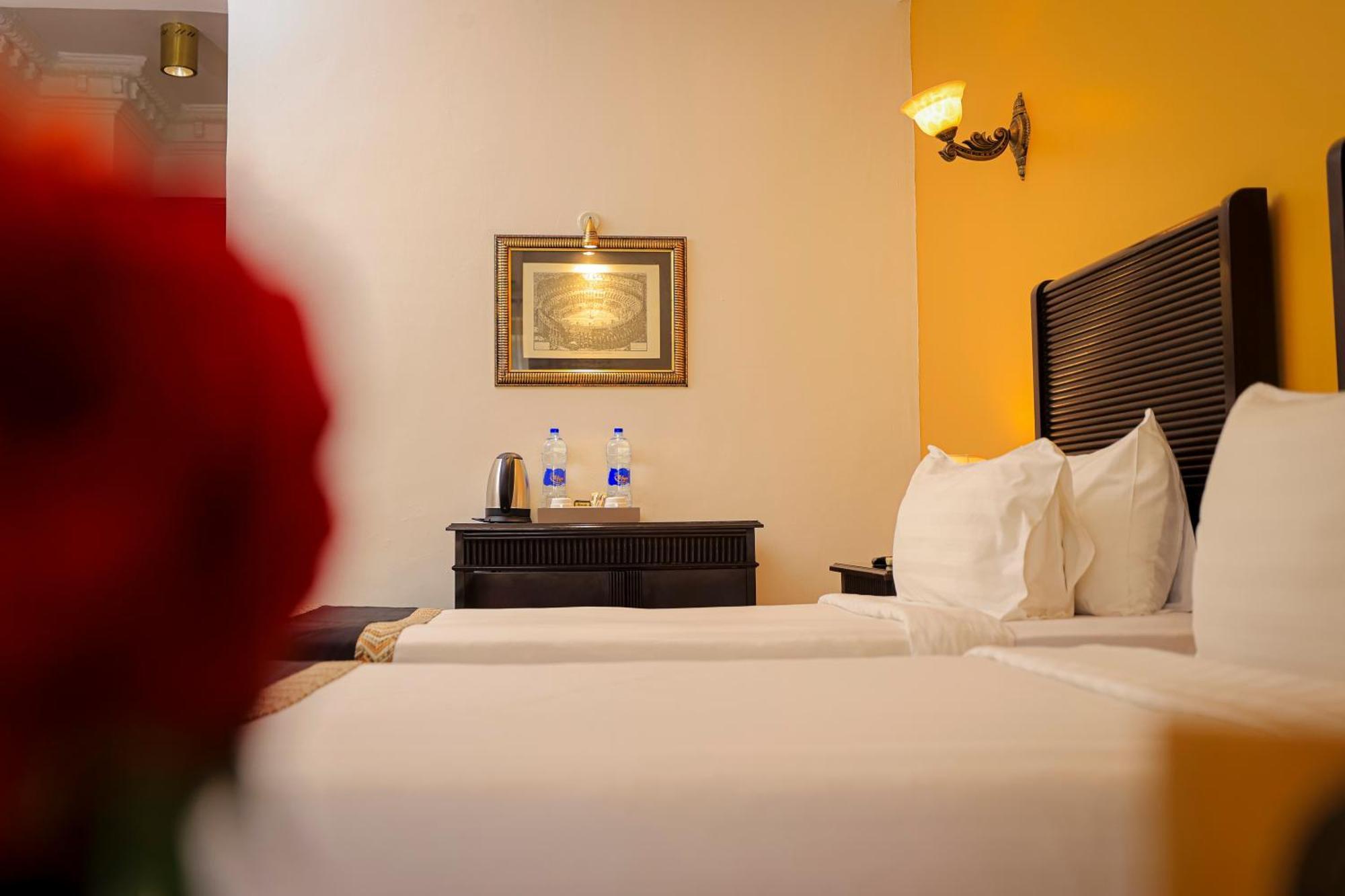 Colosseum Boutique Hotel & Spa Dar es Salaam Rum bild
